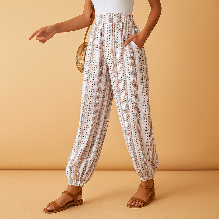 Hoge taille damesbroek met boho uitstraling en losvallende pasvorm, ideaal voor casual en chique zomerse outfits.