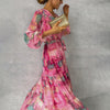 Flowy Women’s Wrap Dress with Vibrant Floral Pattern